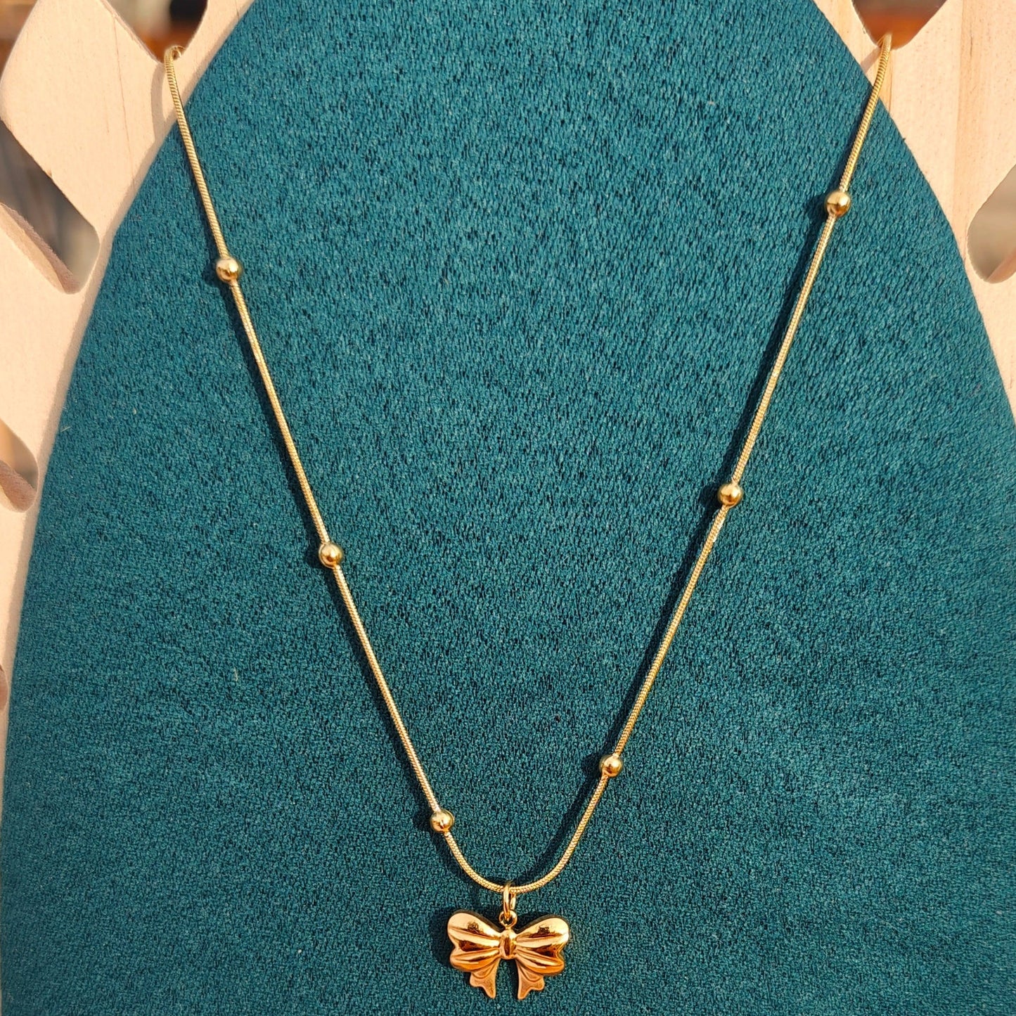 Bow Glow Necklace